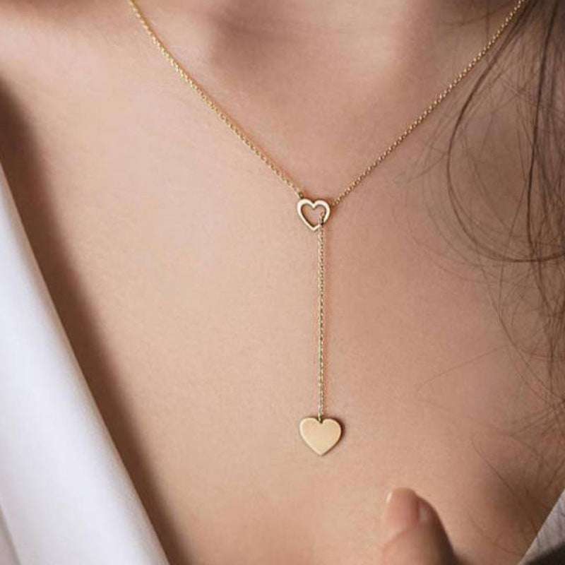Long pendant heart-shaped necklace in gold stainless steel with simple stylish design for women party gift