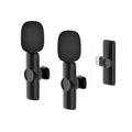 Zwarte draadloze microfoon set met noise-cancelling en compacte clip voor mobiel gebruik en live streaming.