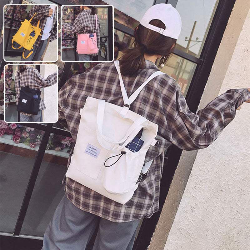Woman wearing white Harajuku style canvas tote backpack with plaid shirt and cap, showing multiple color options black, pink, and yellow Harajuku Canvas Tassen bags