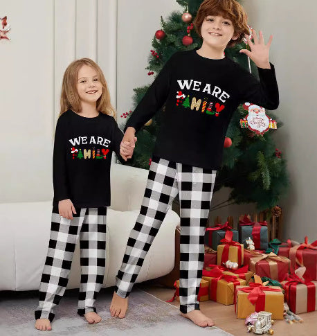 Lange mouwen broek met letterprint en ruitmotief Ritchy's Shop