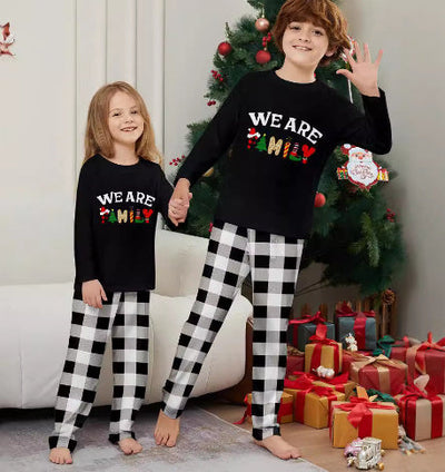 Lange mouwen broek met letterprint en ruitmotief Ritchy's Shop