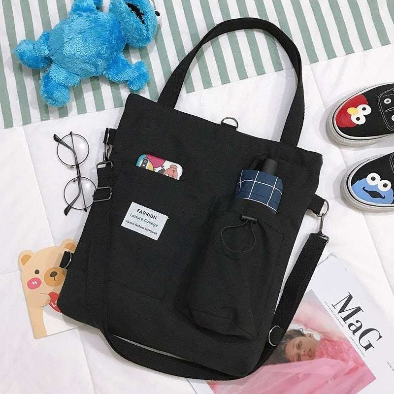 Zwarte Harajuku canvas tas met extra zakken, stijlvol en comfortabel, trendy damesrugzak tote bag