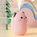 Luchtbevochtiger schattige kat in roze met cute design en aromadiffuser functioneel en stijlvol