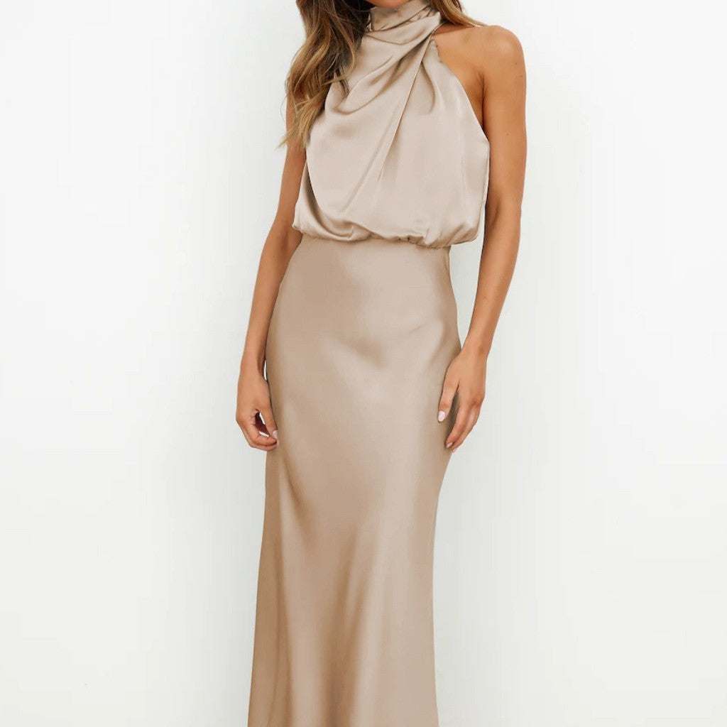 Beige sleeveless summer dress with draped neckline and fitted waist in polyester fabric
