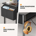 Modern zwart thuiskantoor bureau met hoofdtelefoon haak en zijdelingse opbergzak.