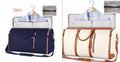 grote reistas travel bag with front zipper pocket and shoulder strap in navy blue and cream colors