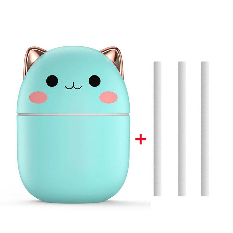 Luchtbevochtiger schattige kat in turquoise met gouden oortjes en drie aroma diffuser staafjes