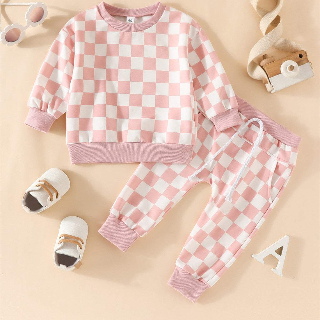 Roze geruit baby-truipakje voor meisjes met lange mouwen en lange broek in katoenen stof