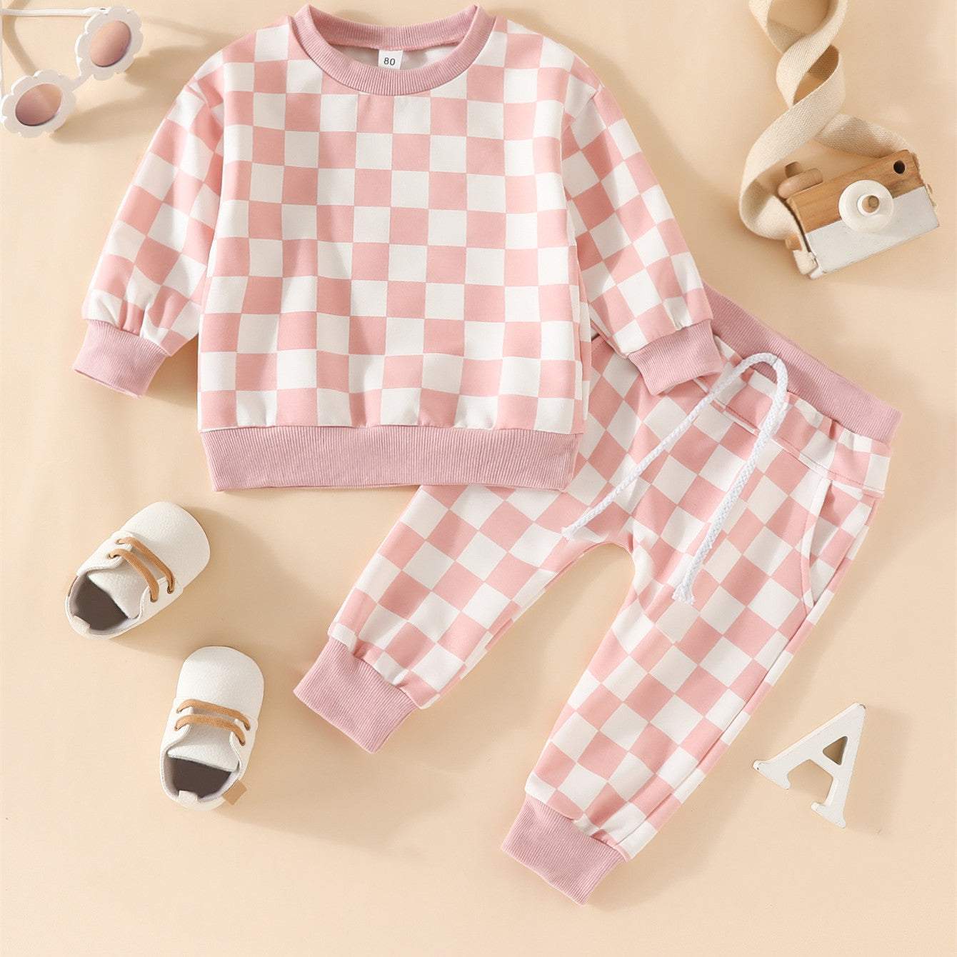 Roze geruit baby-truipakje voor meisjes met lange mouwen en lange broek in katoenen stof