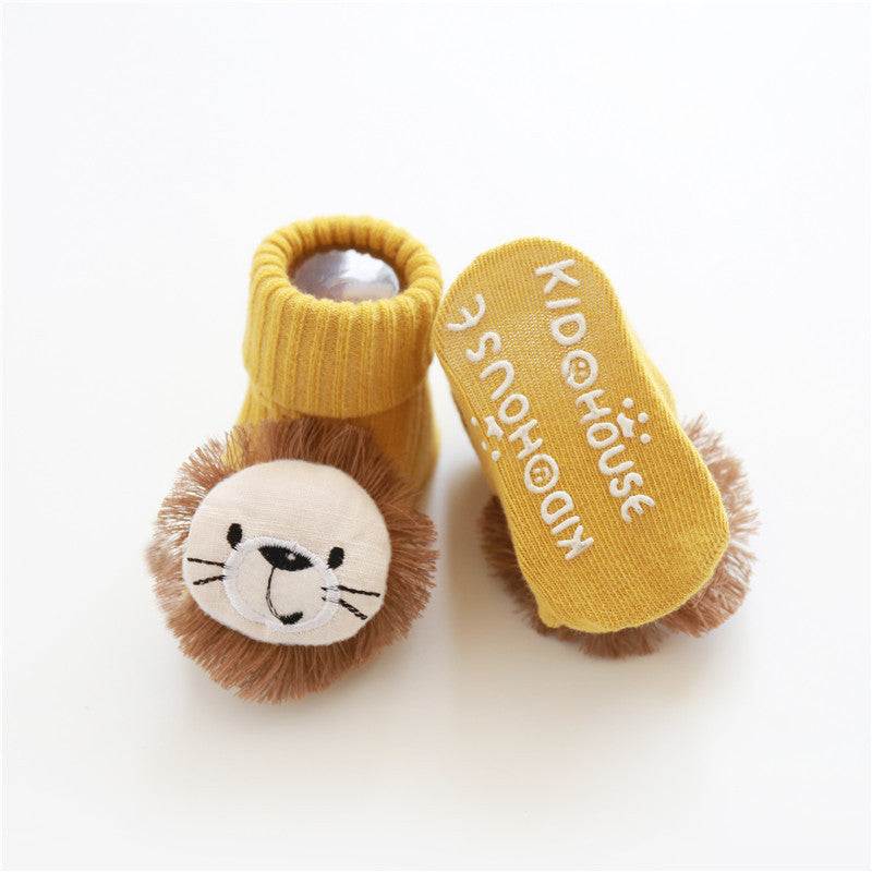 yellow baby socks with lion face design and soft mane plush on feet