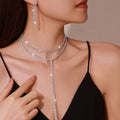 Silver rhinestone hot sale exquisite claw chain necklace and matching earrings set worn by woman
