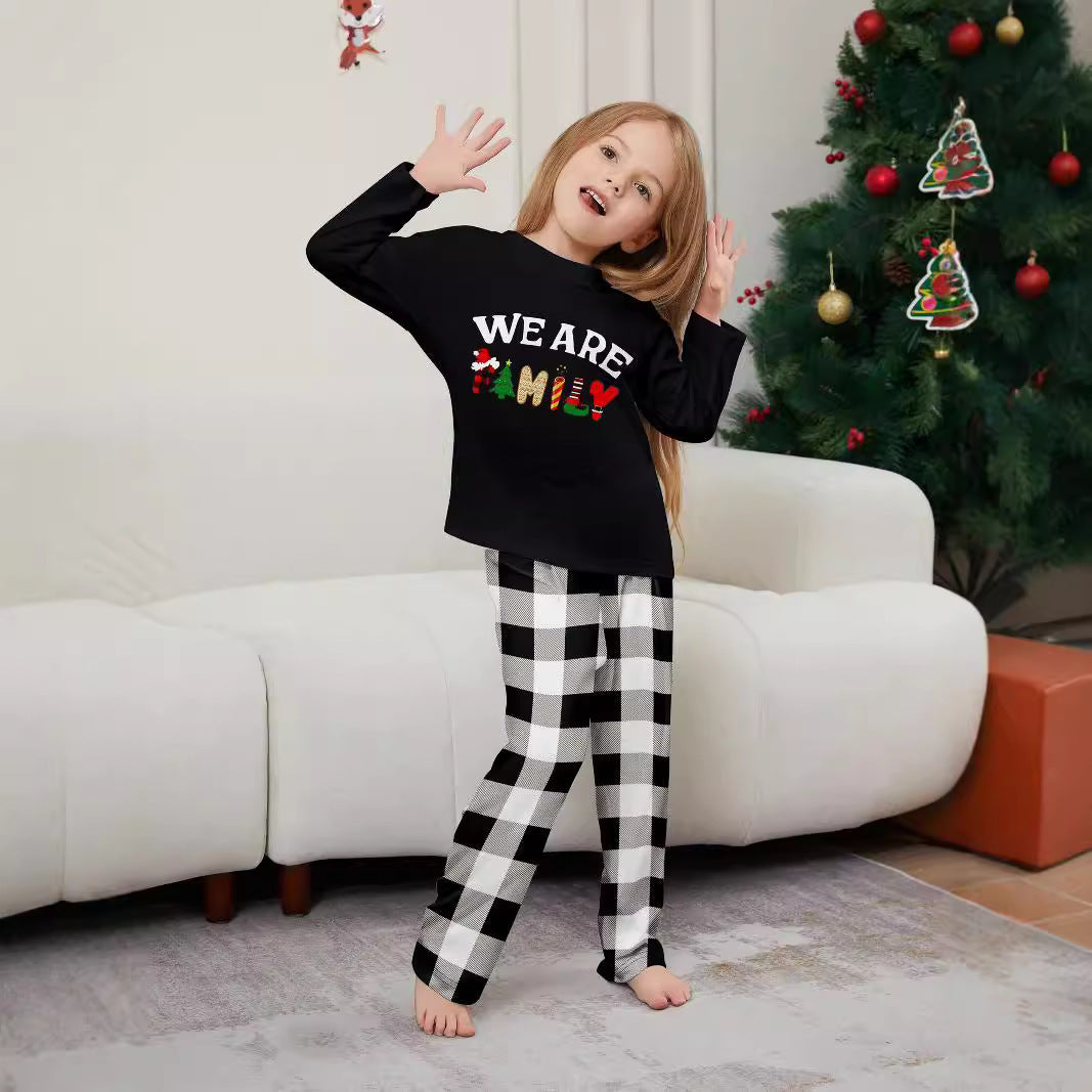 Lange mouwen broek met letterprint en ruitmotief Ritchy's Shop
