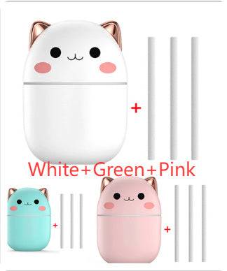 Luchtbevochtiger schattige kat in wit, groen en roze met cute kattengezicht en aroma diffuser stokken