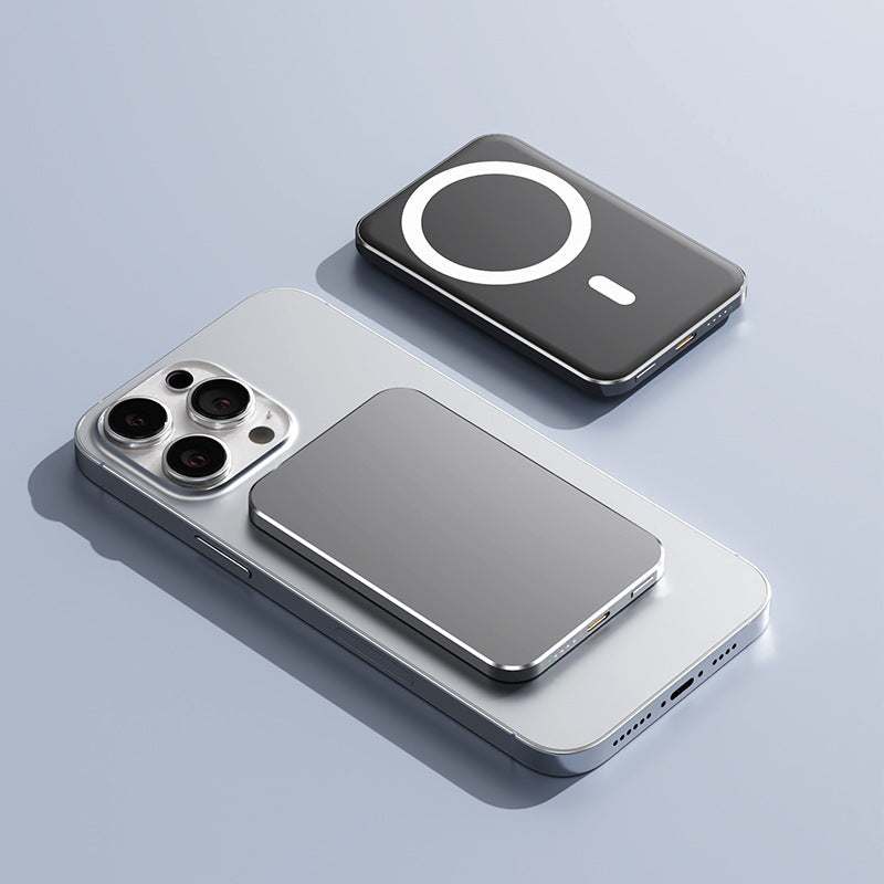 Magsafe magnetic wireless fast charging portable power supply attached to smartphone