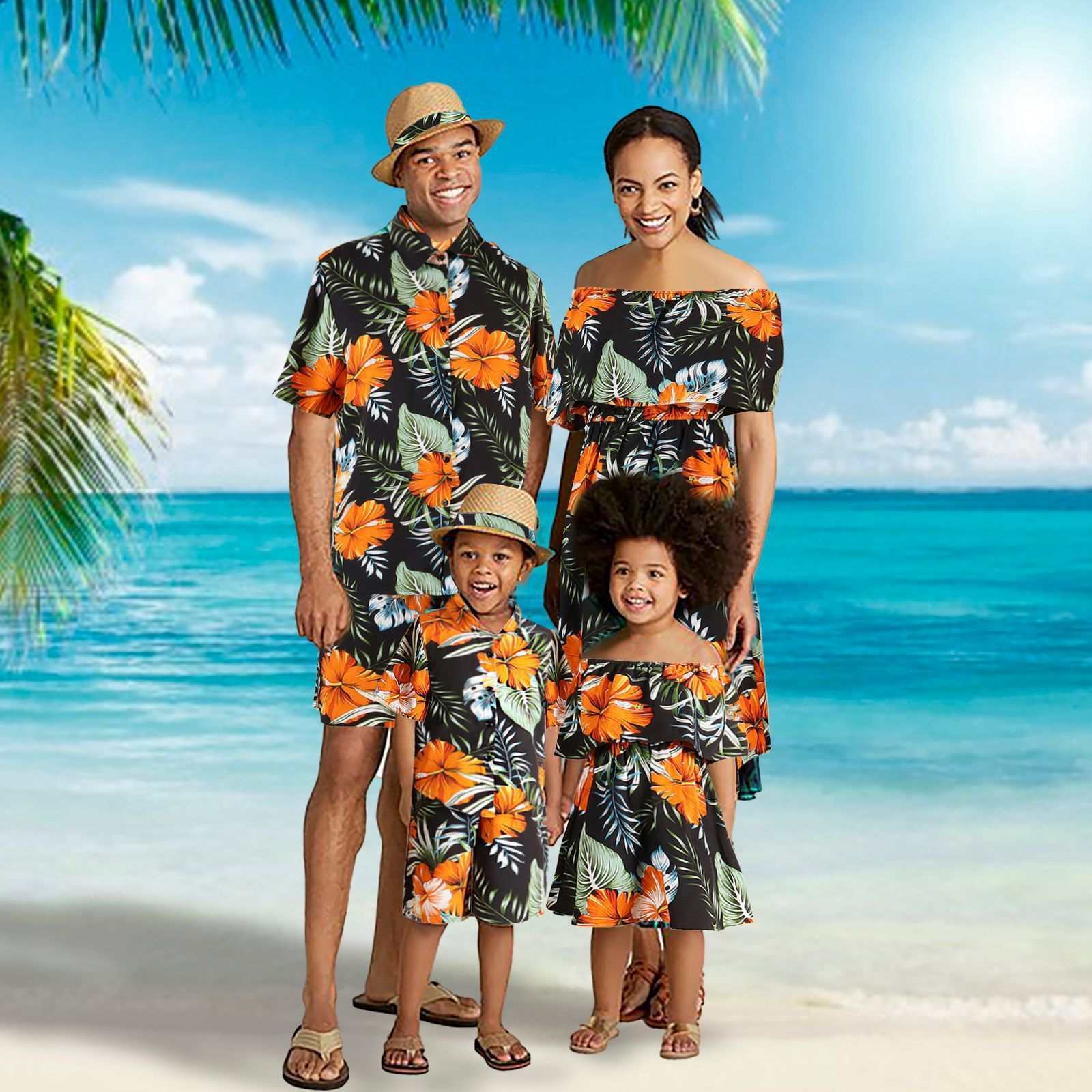 gezin van 4 vakantie reizen in bijpassende Hawaii ouder-kind kleding met oranje bloemenprint op het strand