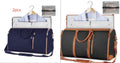 Grote reistas travel bag with multiple compartments and shoulder strap in navy blue and black with brown accents, ideal for stylish and comfortable travel.