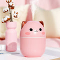 Roze luchtbevochtiger in schattige kattenvorm met aroma diffuser en stoomuitstoot
