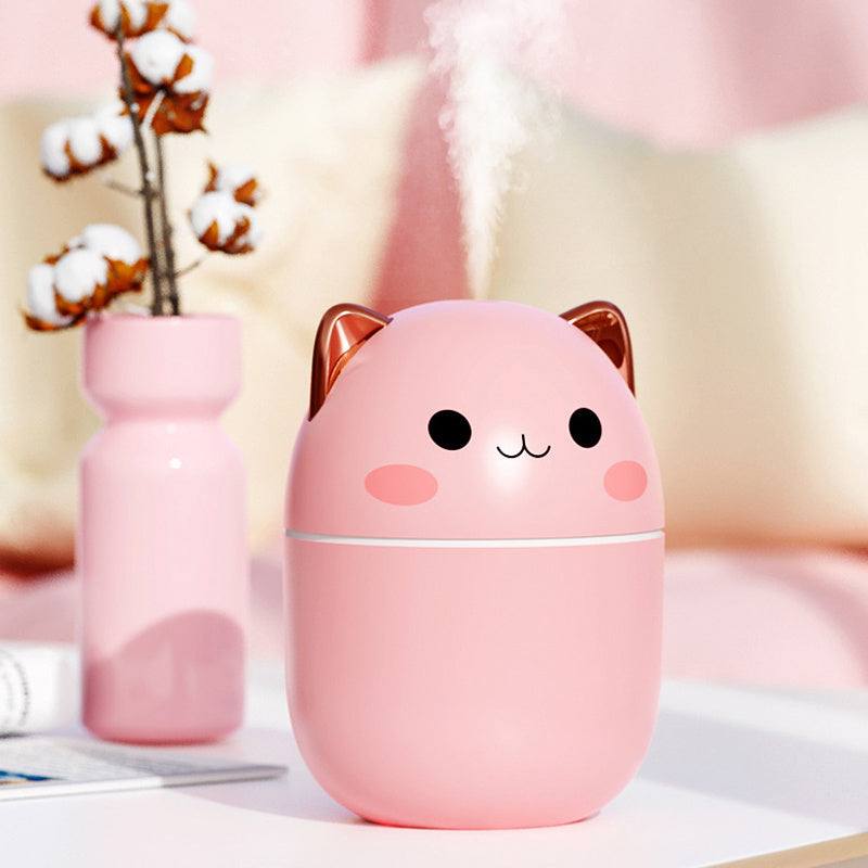 Roze luchtbevochtiger in schattige kattenvorm met aroma diffuser en stoomuitstoot