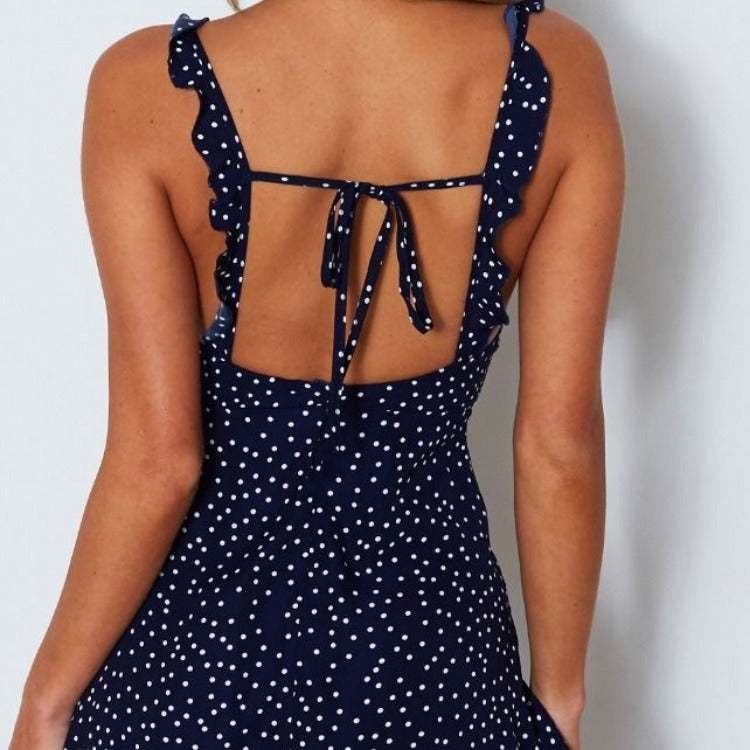 Dames navy blauwe polka-dot strappy jurk met open rug en volantbandjes