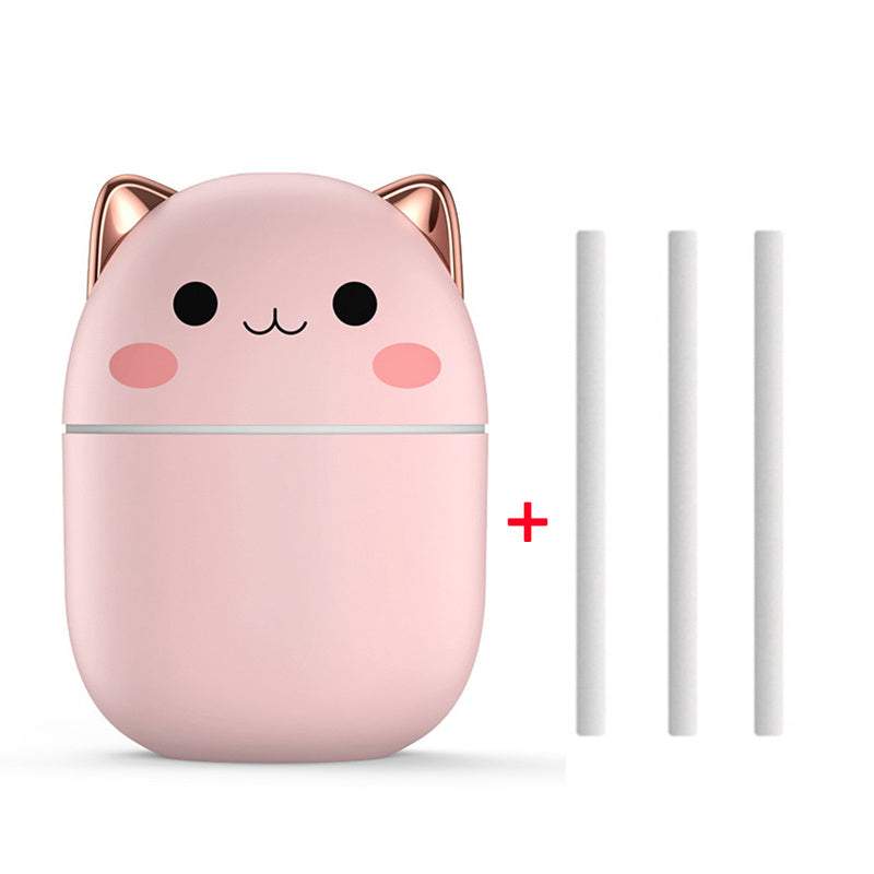 Roze luchtbevochtiger schattige kat met goudkleurige oortjes en drie aroma diffuser filters