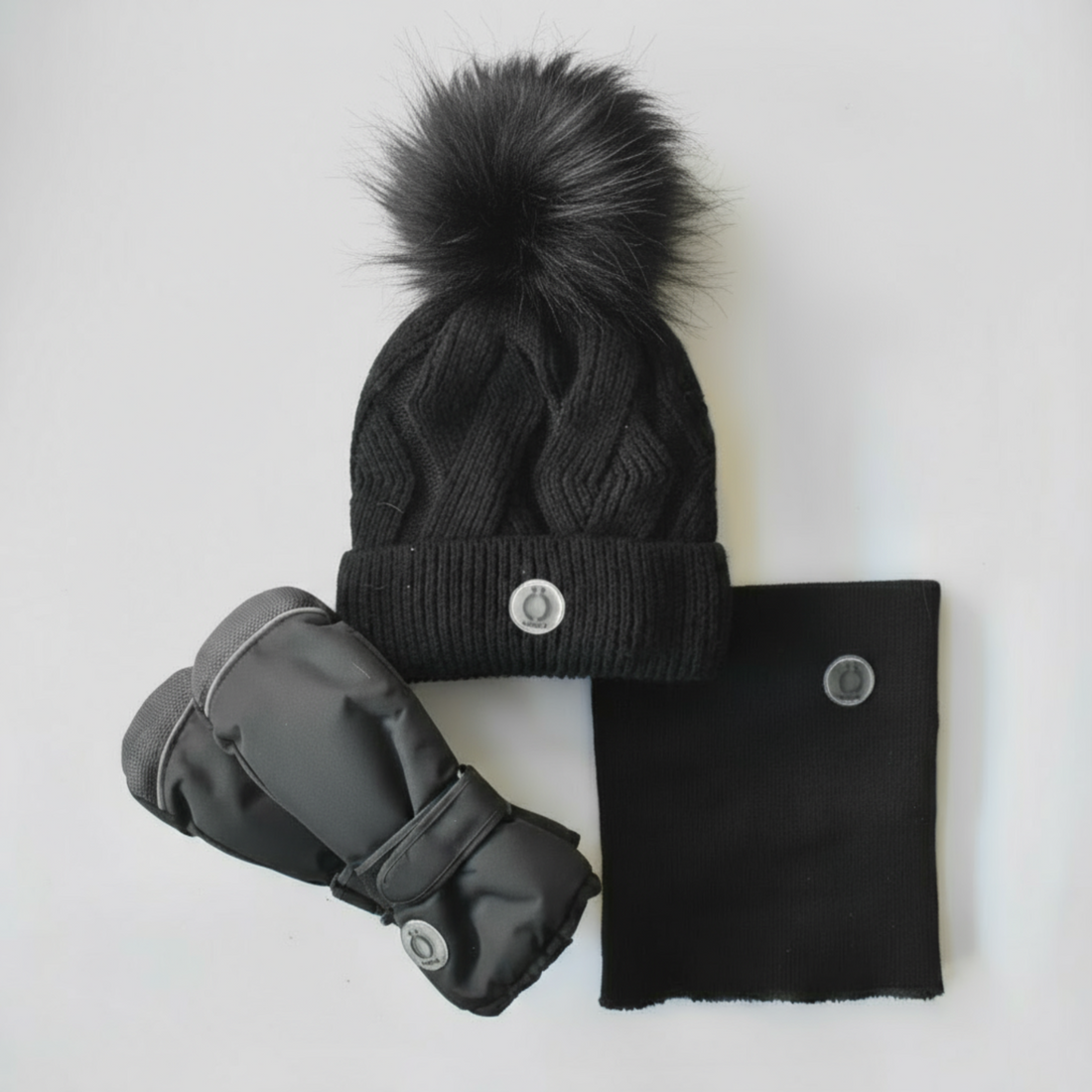 ÖSNO Snowsuit winter bundle with black knit tuque, blue fur pompom, mittens, and neck warmer accessories